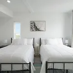 Enjoy City Skyline Views From Private Roof Deck!