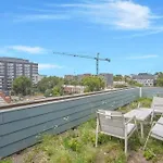 Enjoy City Skyline Views From Private Roof Deck!